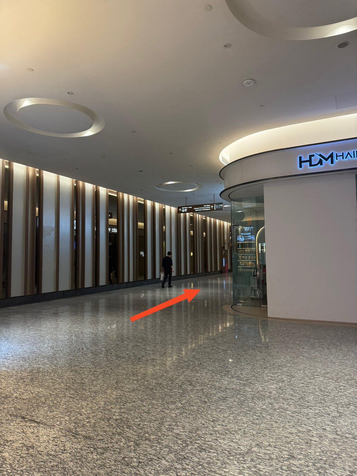 Continue straight until you see a small lift lobby on the left.